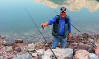 Pescatore nei pressi del lago di Molveno, Trentino - Alto Adige