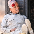 Uomo con tipico copricapo, Nepal