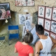 Disegnatore di strada con turisti, San Marino